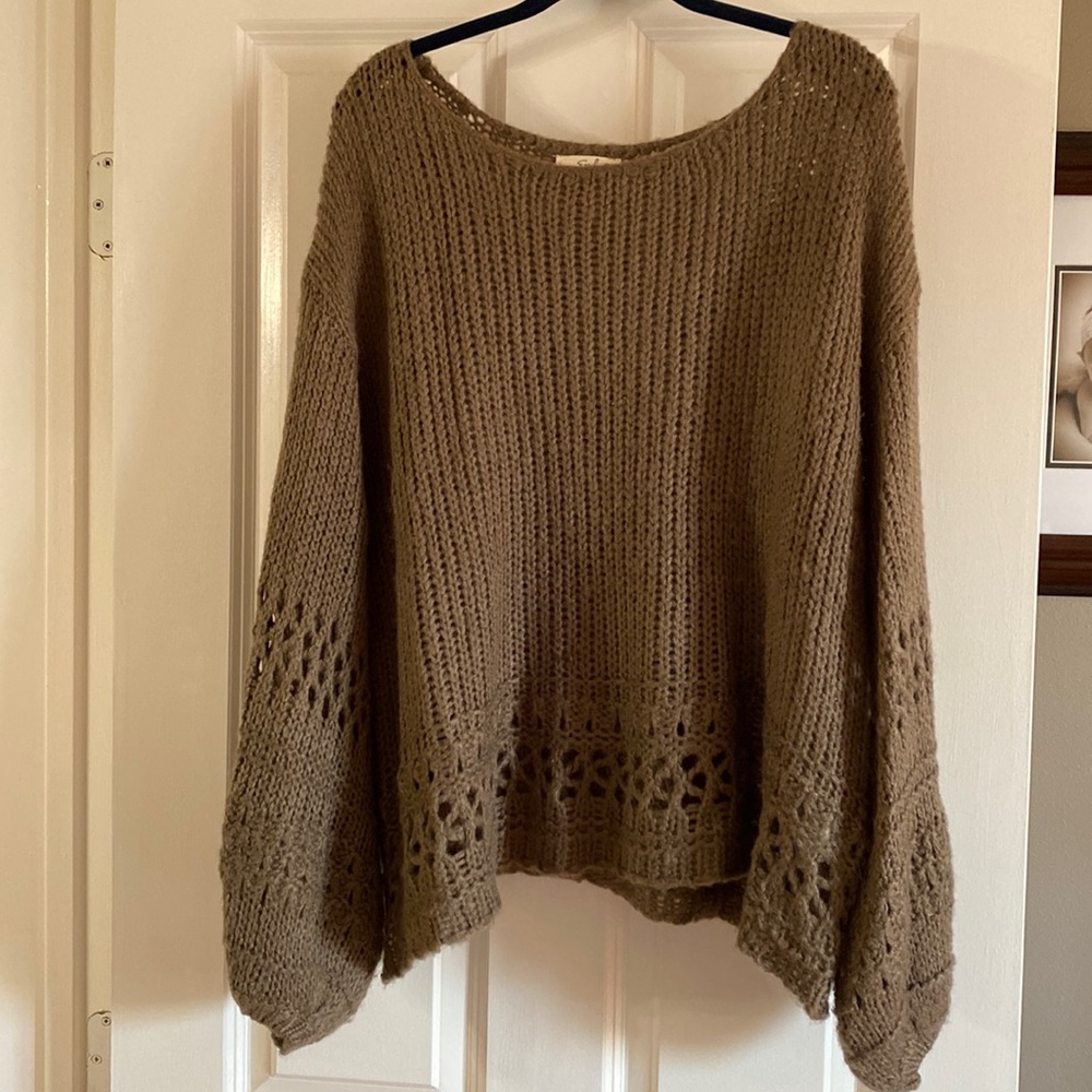 Taupe Colored sweater.